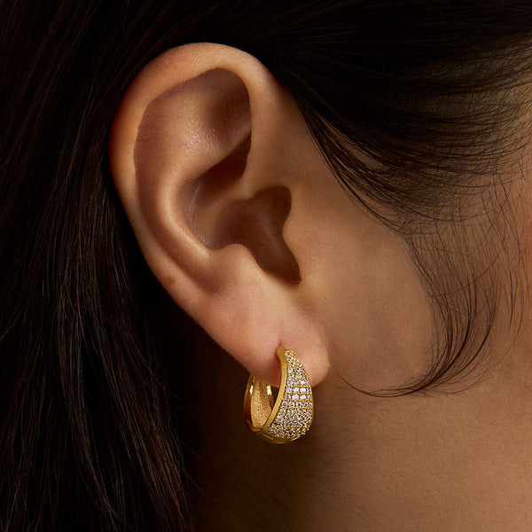 MARGAUX PAVE HUGGIE HOOPS in Gold