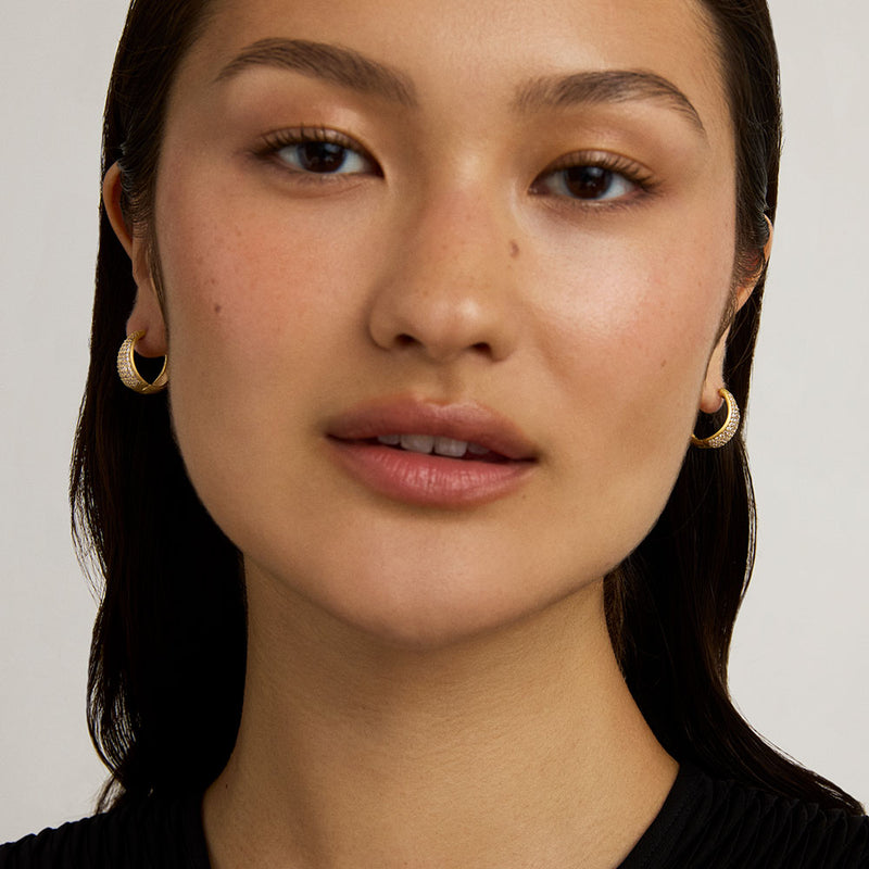 MARGAUX PAVE HUGGIE HOOPS in Gold